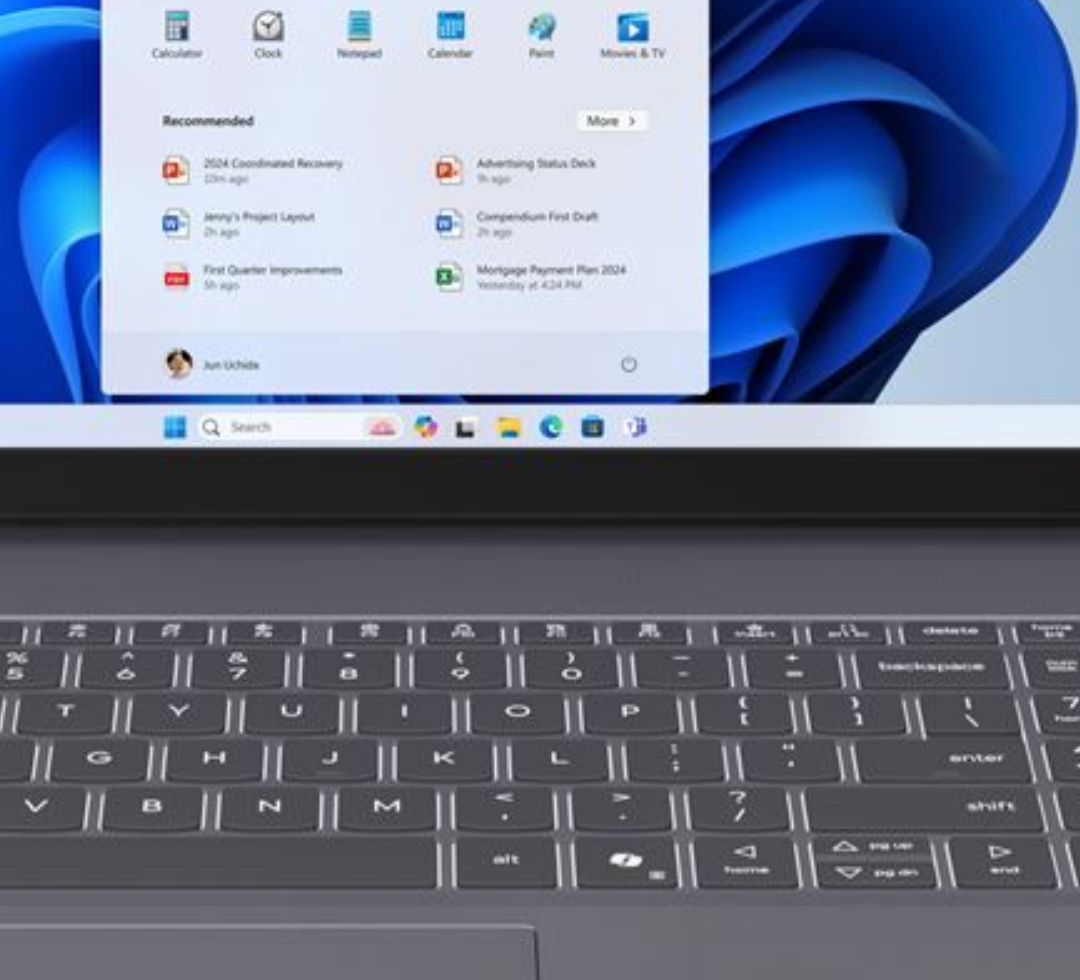 A lenovo ideapad's keyboard showing the keyboard. Of particular interest is the Copilot key ("Cancer Button")